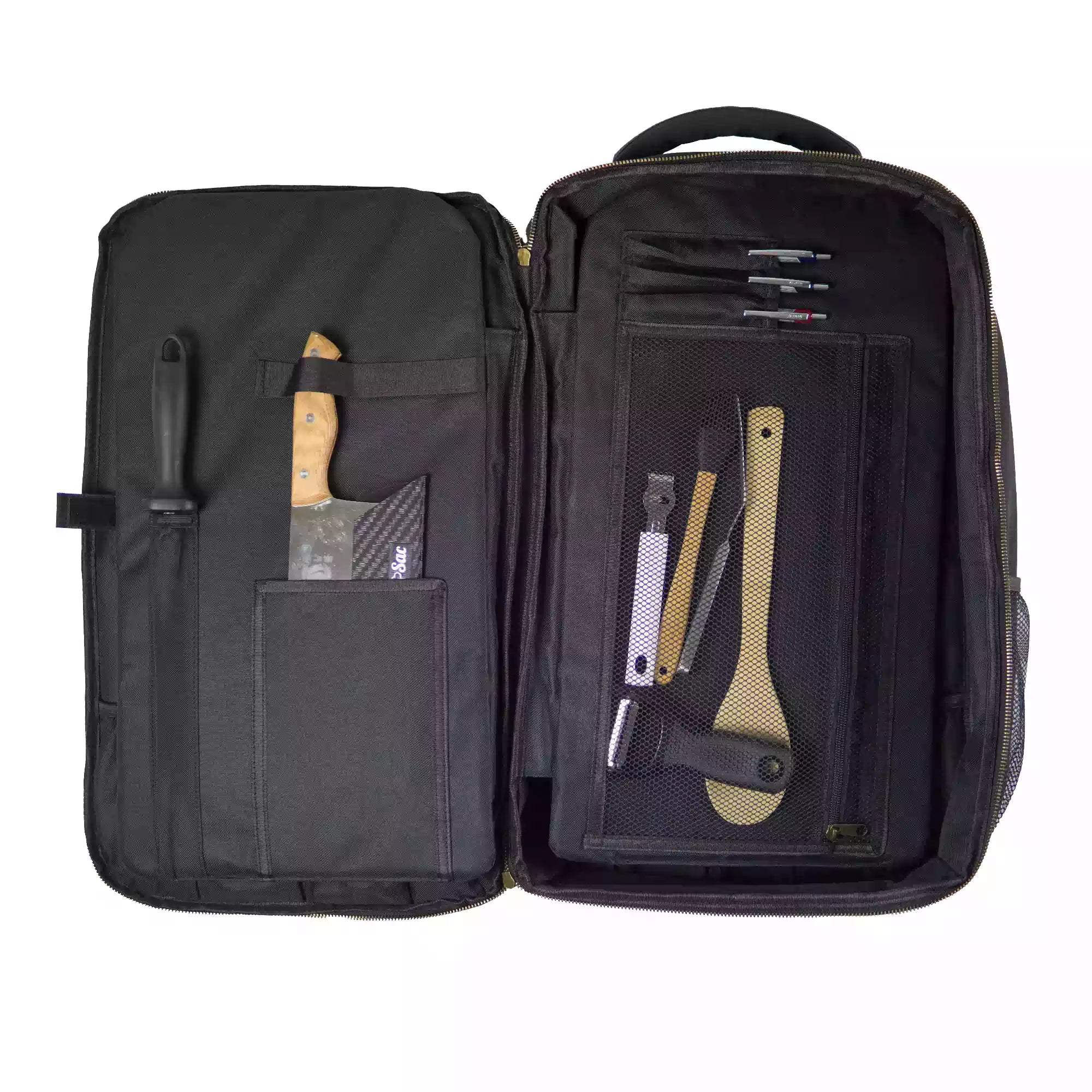 Black chef backpack with open panel compartments containing tools on a white background